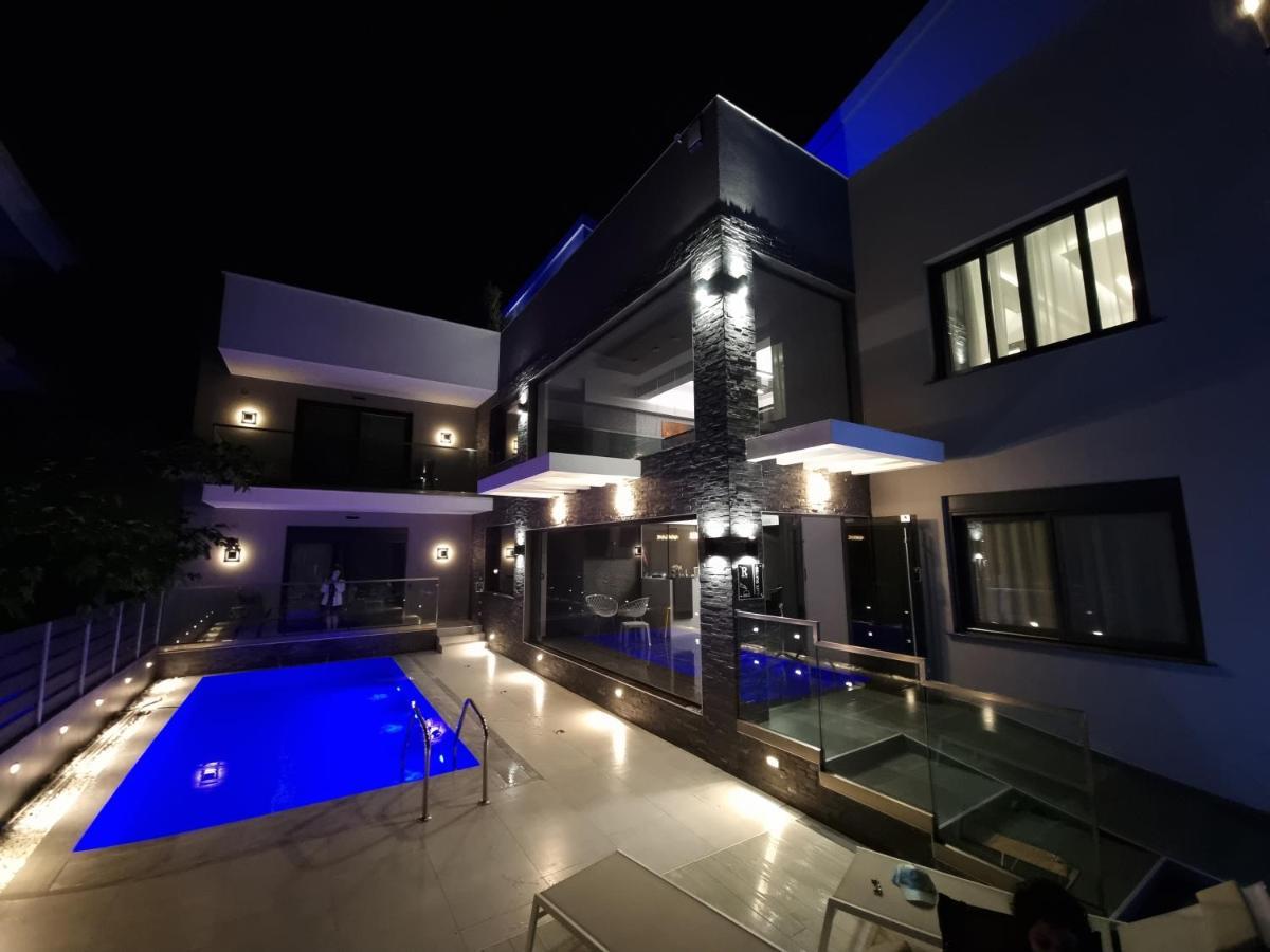 Luxsuites Офринион Екстериор снимка