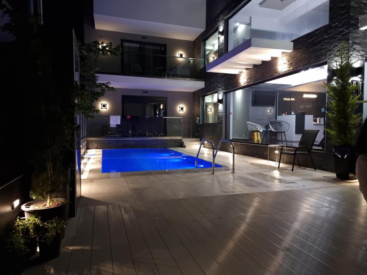 Luxsuites Офринион Екстериор снимка