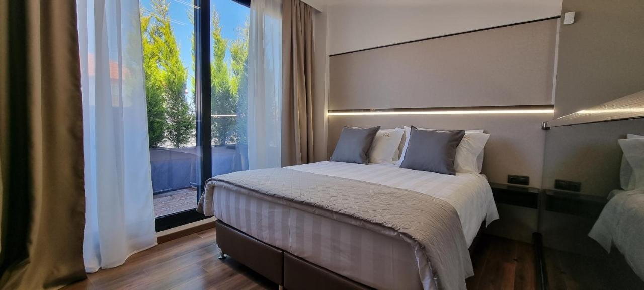 Luxsuites Офринион Екстериор снимка