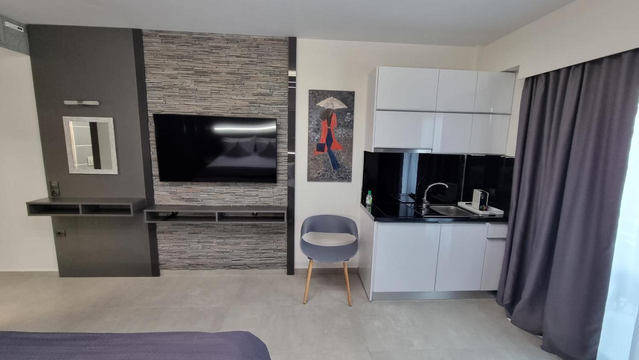 Luxsuites Офринион Екстериор снимка