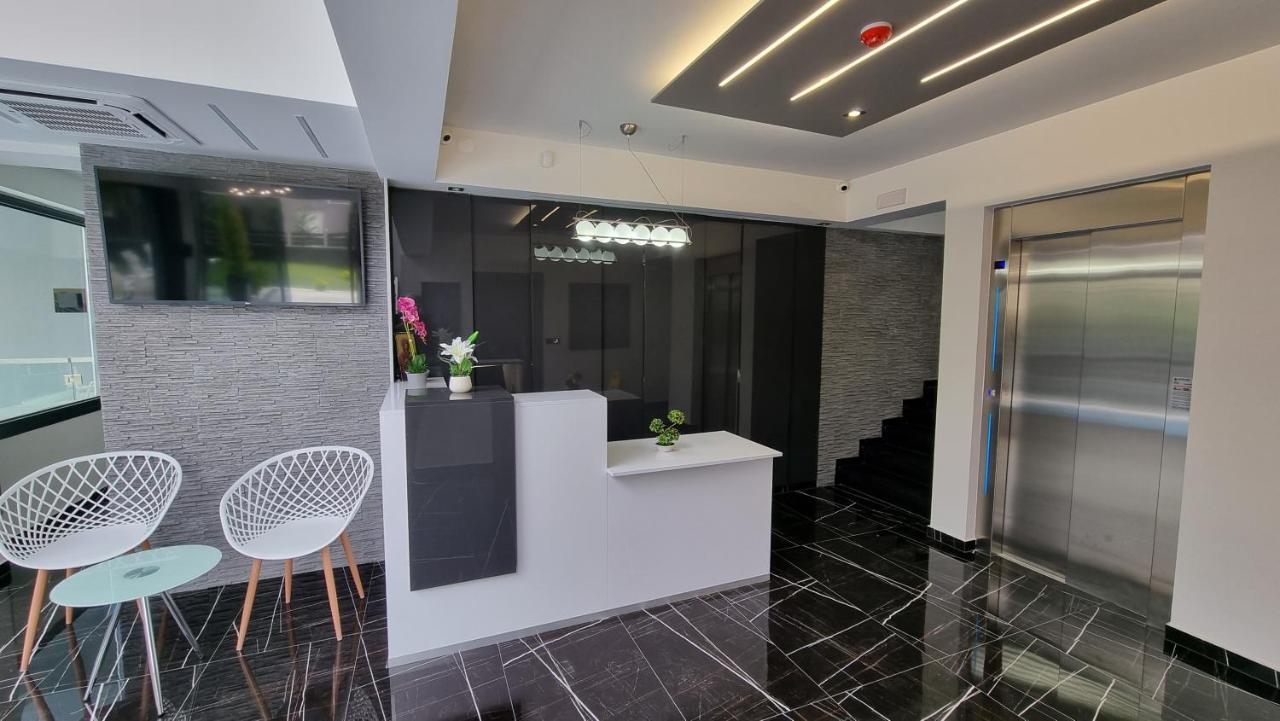 Luxsuites Офринион Екстериор снимка