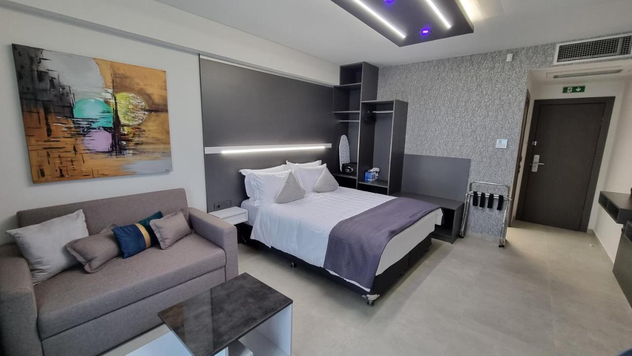 Luxsuites Офринион Екстериор снимка