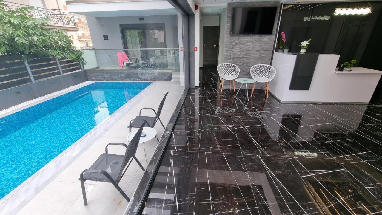Luxsuites Офринион Екстериор снимка