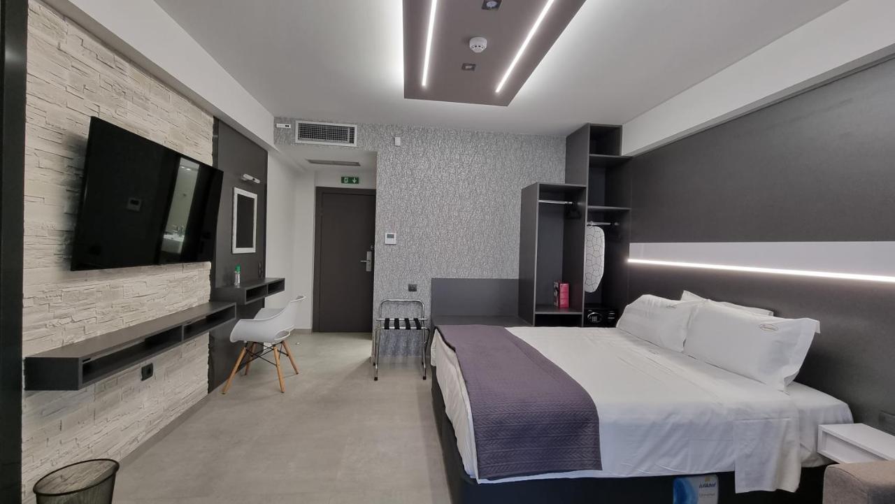 Luxsuites Офринион Екстериор снимка
