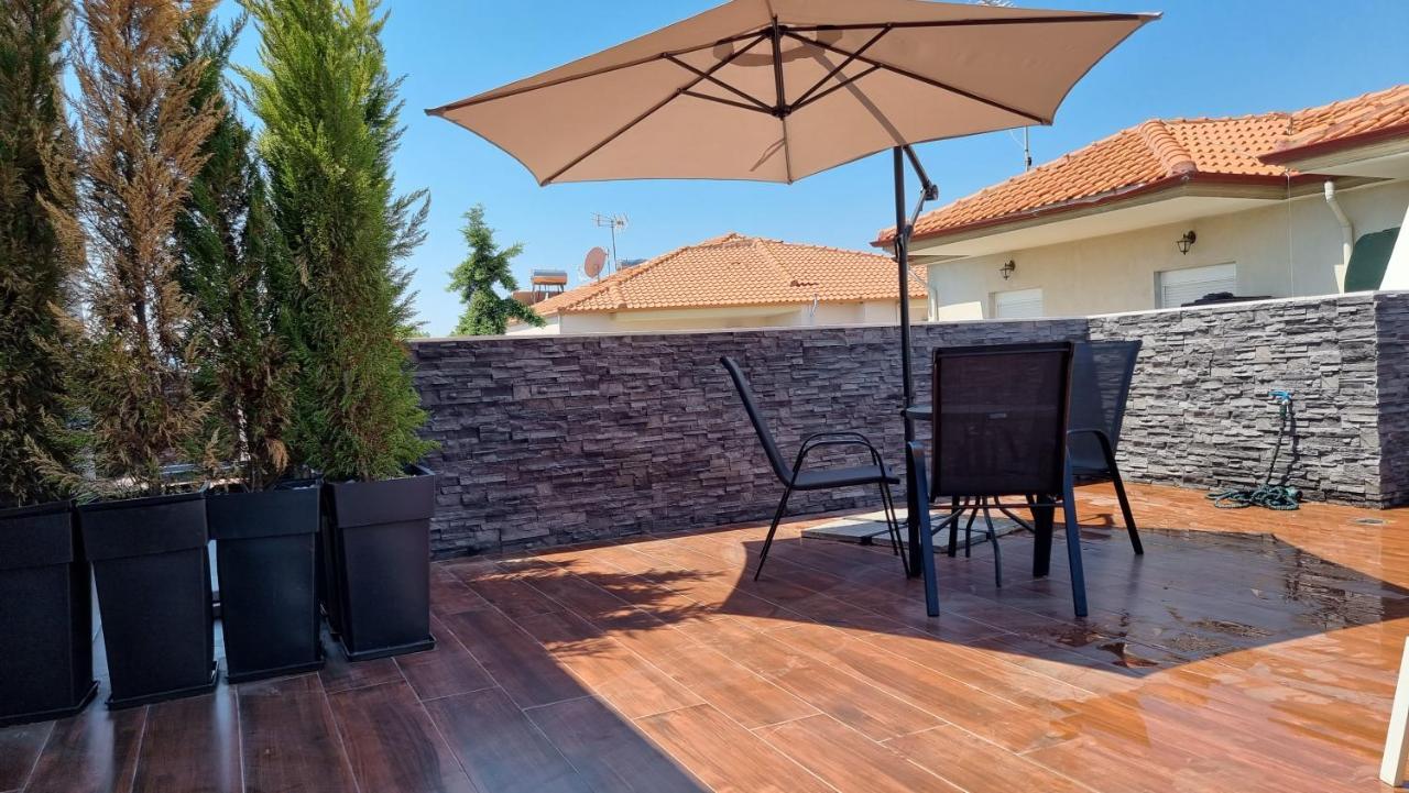 Luxsuites Офринион Екстериор снимка